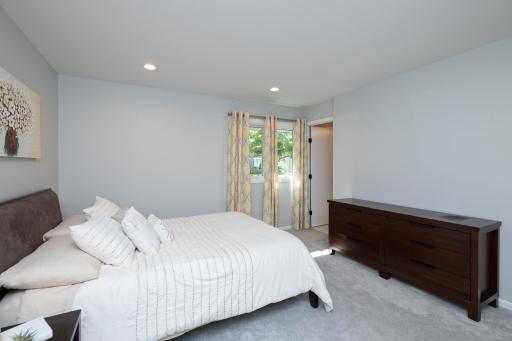 Neutral colors, recessed lights and private 3/4 bath