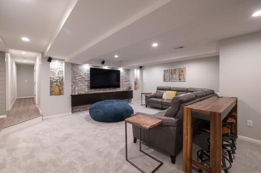 Lower level family room featuring video area with surround sound