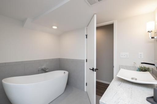Great lower level bath for those visiting guests