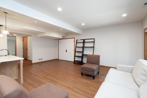 View of the In-Law suite living room from lower-level game room entrance