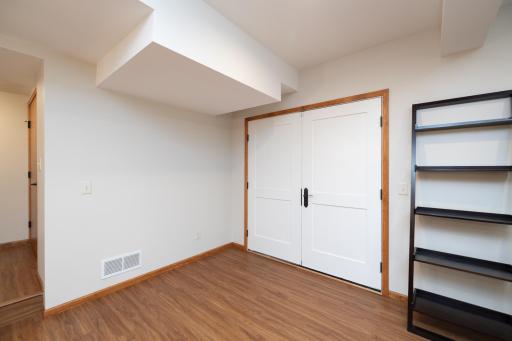 Private side entrance to the In-Law suite which features its own furnace, AC and 200 amp electric