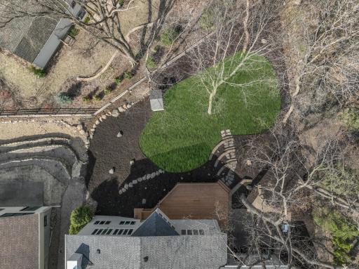Digitally enhanced photo. Sellers are having new sod put down in the area shown