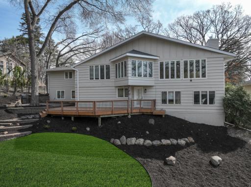 View of the back of the home. This photo has been digitally enhanced to show area where sod will be laid