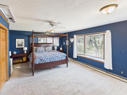 Primary MF Bedroom with backyard view