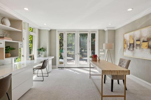 Sunlit workspace with private patio access.
