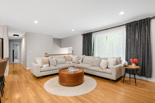 All new trim, doors, recessed lighting, paint, re-finished hardwood floors on the main level.