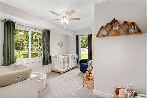 Nice-sized 2nd bedroom on the upper level with new trim.