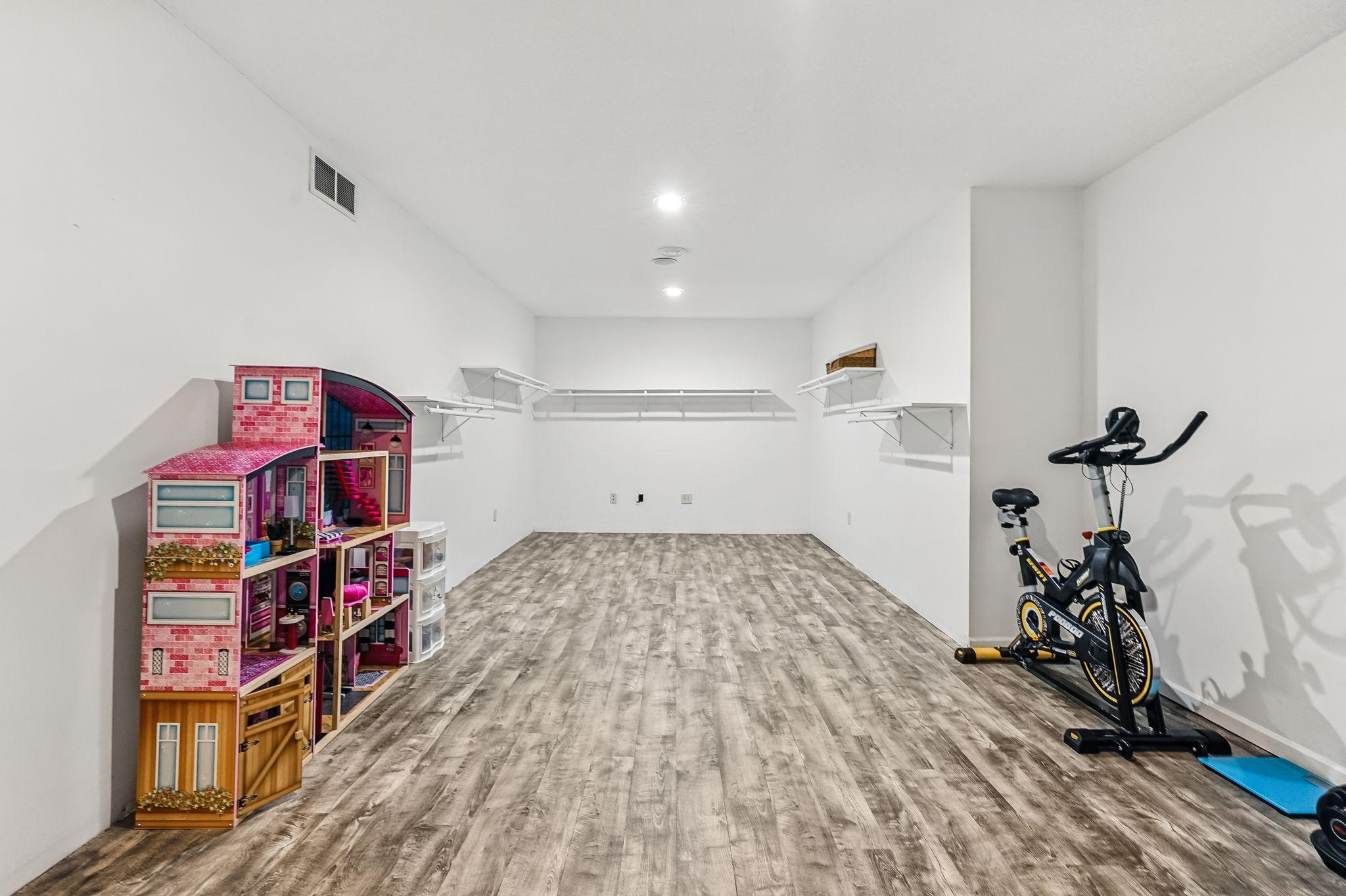 Lower level bonus room - exercise room / play room/ storage