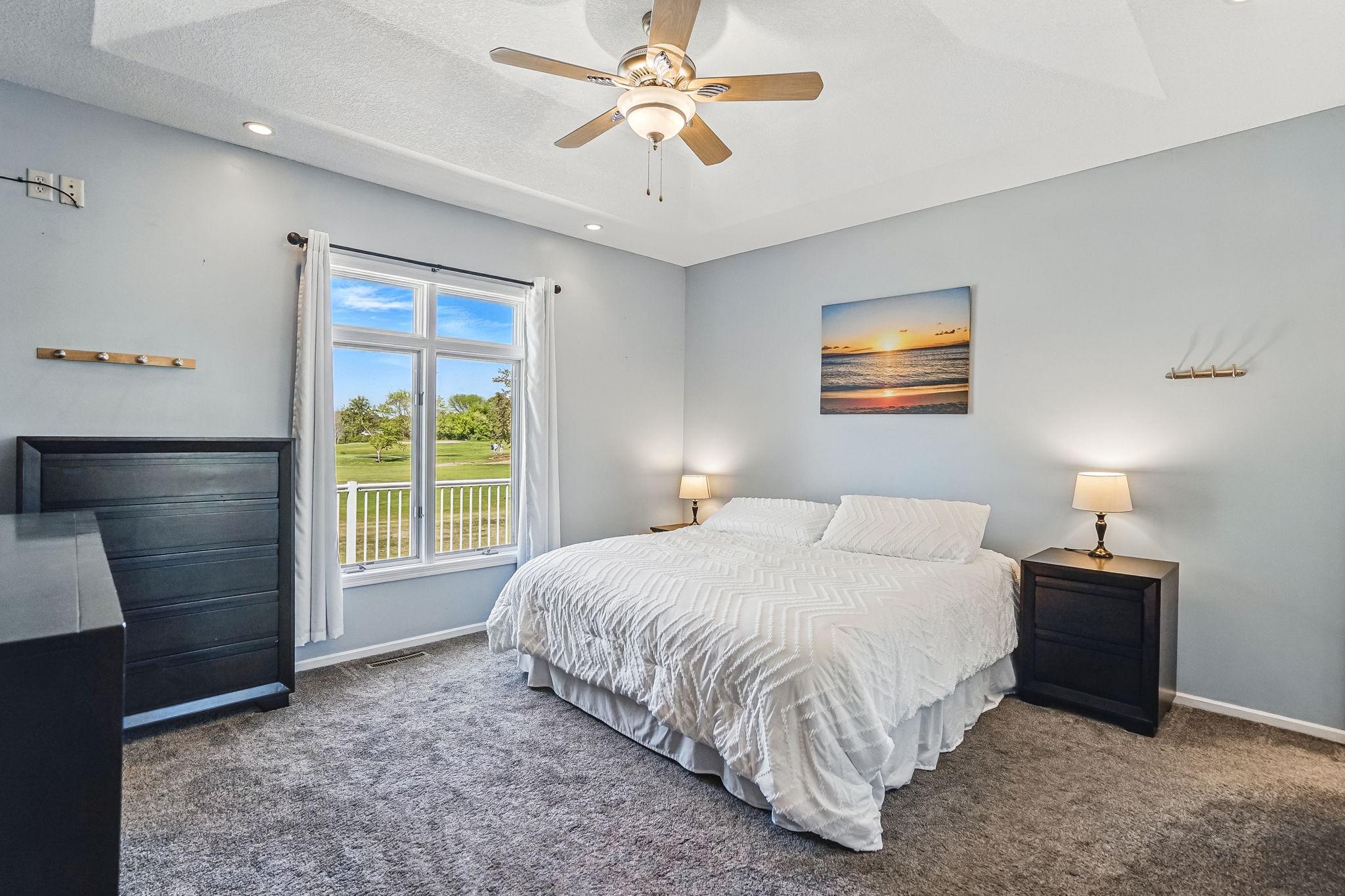 Main level primary suite with walk in closet.