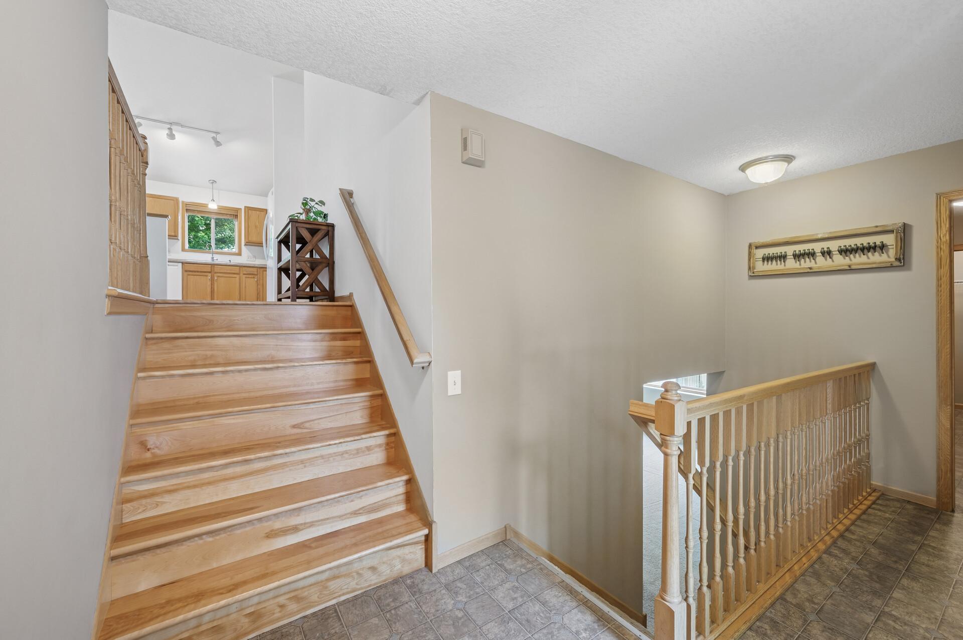Wide Stairway w/Hardwood Stairs & Floors on the Uppler Level