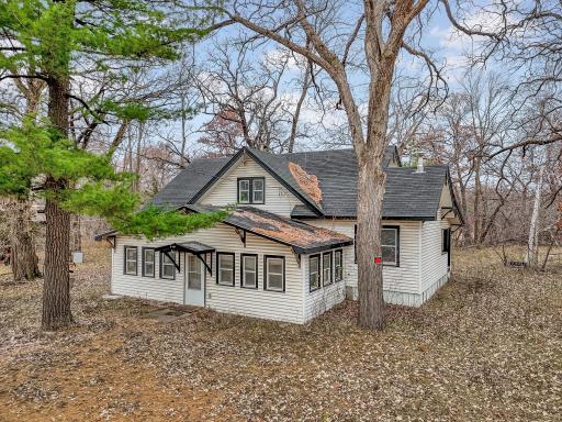 Home on 2 acres and appears to be structurally sound.