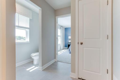 One last view of the owners bath. Photo of model home similar to new Henry plan, color & options will vary.