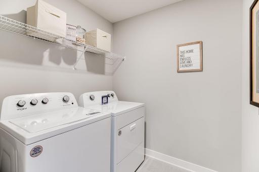 Life's simple pleasures - this one in the form of upper level laundry, just steps from each of the home's upper level bedroom!! Photo of model home similar to new Henry plan, color & options will vary.