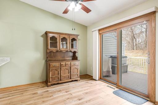 Open dining area leads to huge back deck.