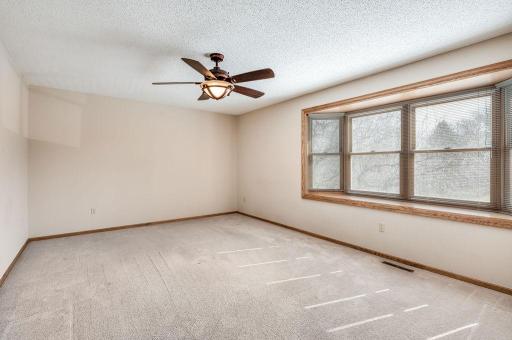 Huge primary bedroom with private access to the full bathroom