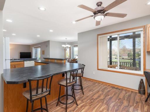 Plentiful counterspace with breakfast bar is perfect for serving friends & family.