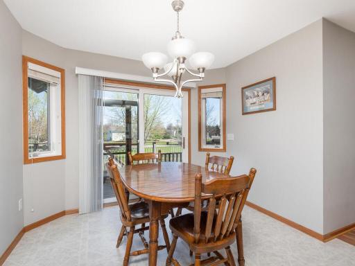 Breakfast nook/Dining Room with great views of the backyard.