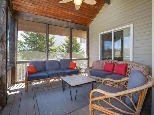 Gorgeous maintenance free screened in porch is fabulous outdoor oasis.