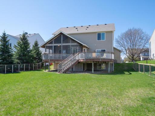 Enjoy this gorgeous screened porch, deck & large, level yard this summer!
