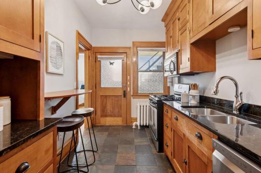 Granite counters, SS appliances and convenient breakfast counter