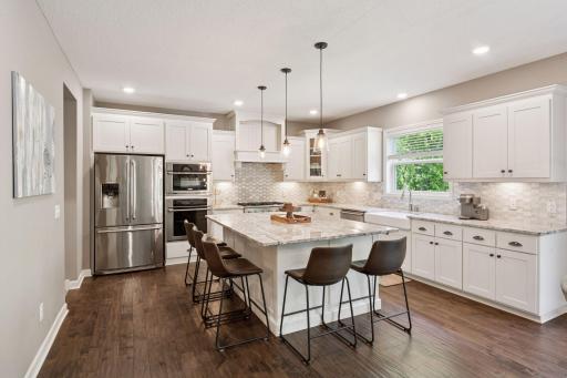Beautiful kitchen with high-end stainless-steel appliances.