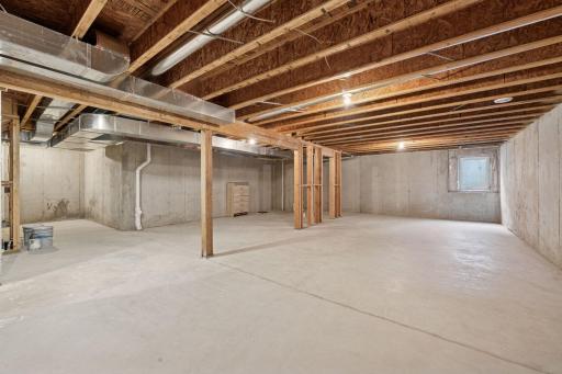 Equity builder - unfinished basement with egress window and roughed in bath.