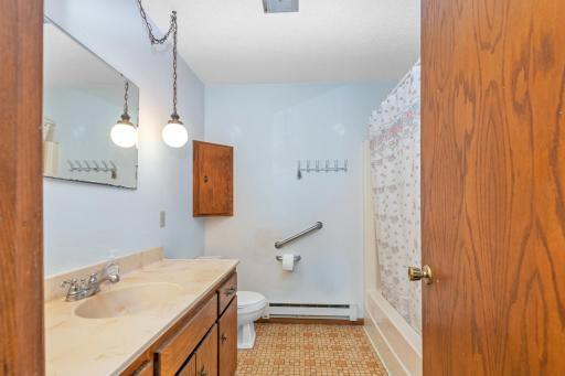 Full bath on main floor & additional 3/4 bath in lower level