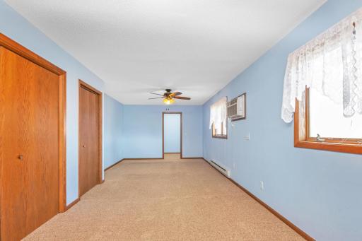 This primary bedroom is super space w/ tons of closet space
