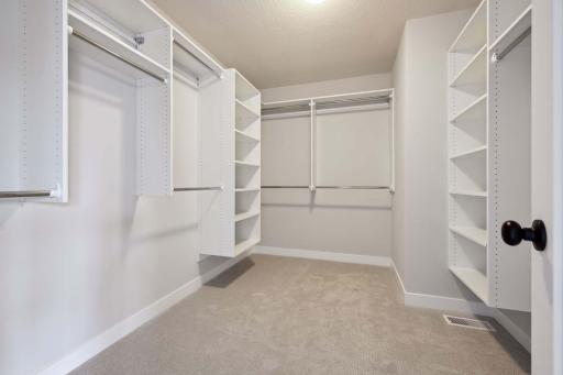 Large owner's closet!
Photos, virtual/video tours may not depict actual home. Features, materials & finishes shown may contain options that are not included in the price.
