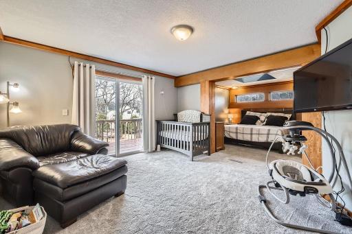 Talk about primary bedroom suites! Sliding glass doors that lead out to a private deck. An attached area for a private office, workout area or nursery. Transom windows and a skylight in the bed area + a stunning bathroom.