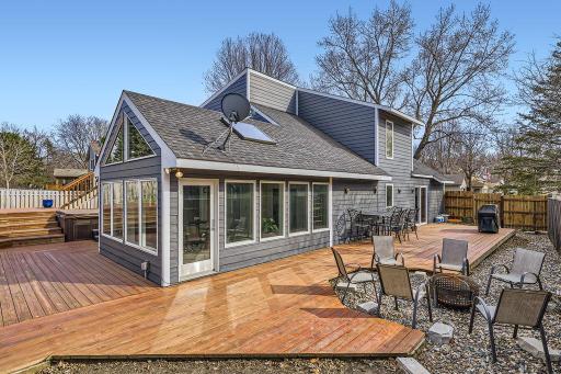 Did I forget to mention, you have bubbling fountains, multiple tiered decks, a great grilling area right off the kitchen, fully fenced backyard, private hot tub area AND a firepit! What more could you want or need??