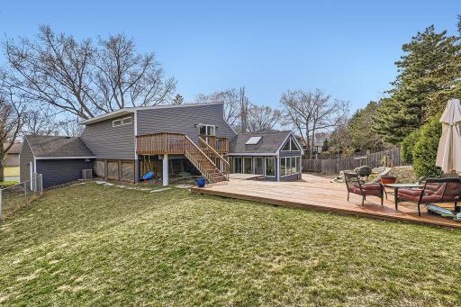 Worried you do not have grass for the pets or kids? Nope. Even with all the decking, there is still a good sized yard to run and play