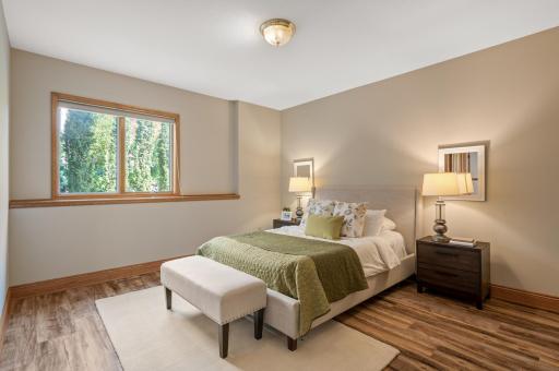 Two generously sized lower-level bedrooms share a Jack-and-Jill bathroom.