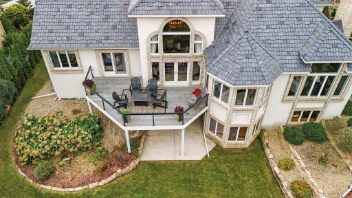 Enjoy the outdoors on the brand-new, maintenance-free deck, or relax on the covered patio surrounded by lush landscaping and mature trees, offering the perfect blend of privacy and beauty.