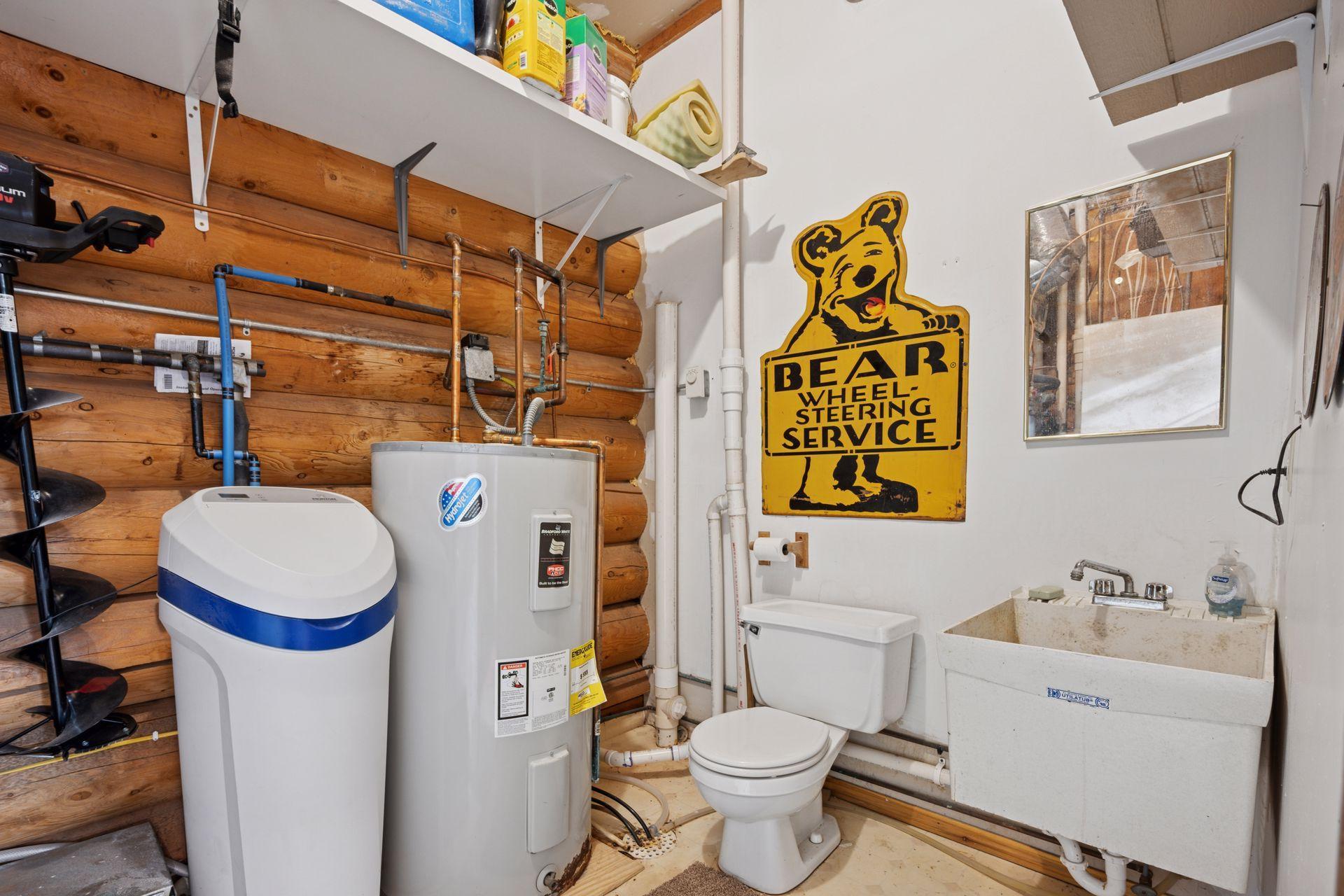 The convenient half bath is tucked in the back of the garage