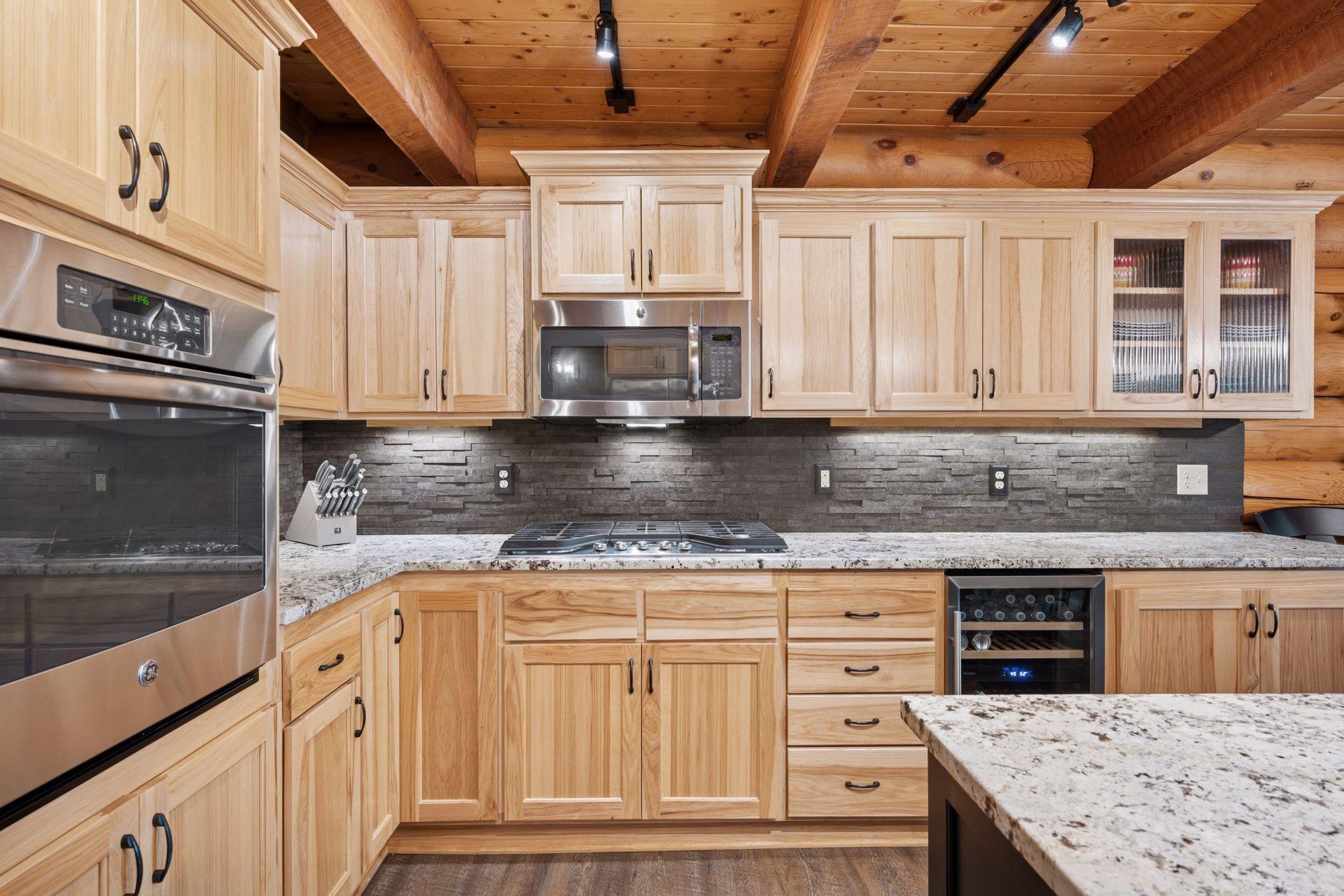 Gas cooktop, wall oven and beverage fridge