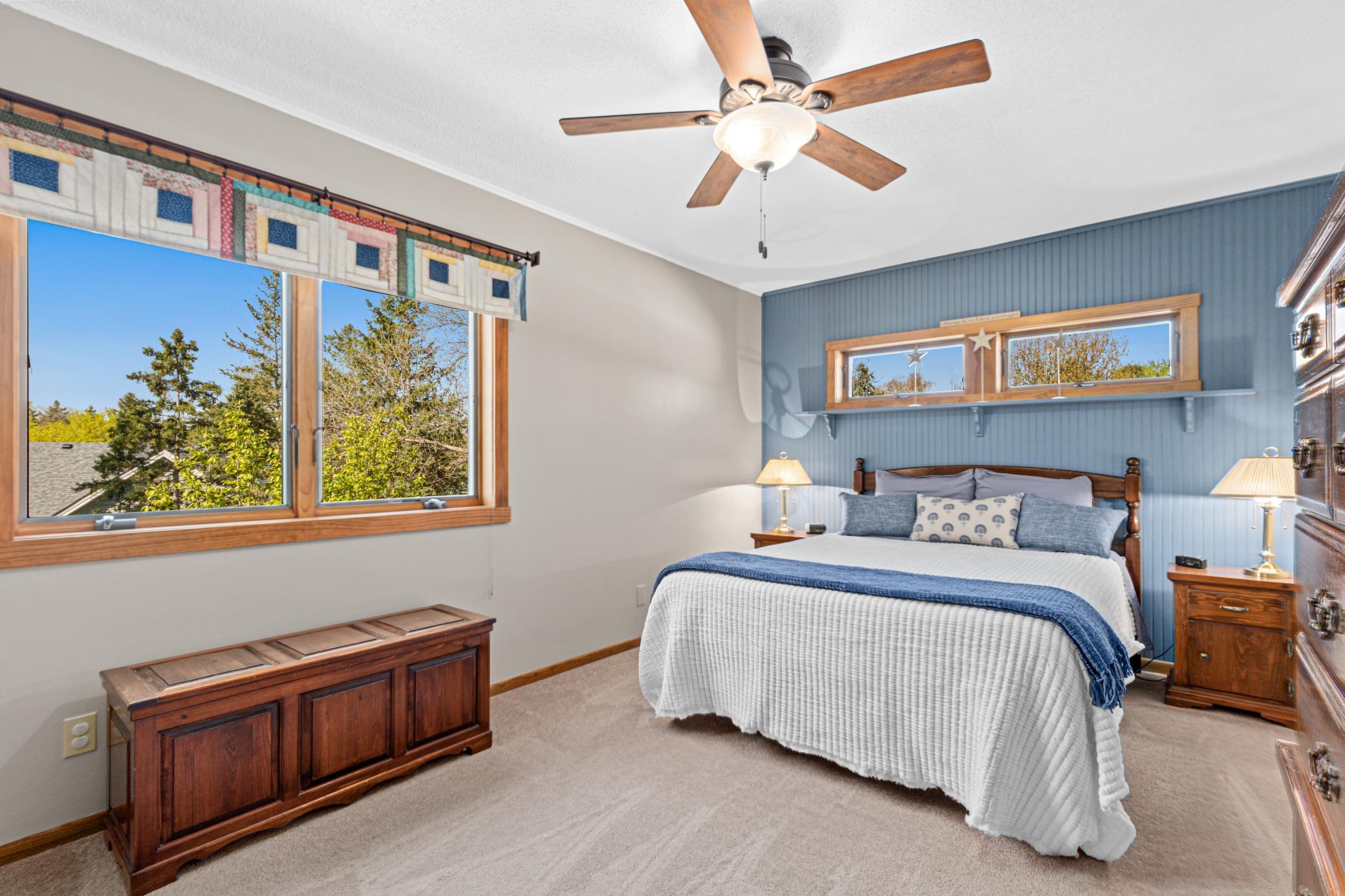 Enjoy the views from the large windows in the primary bedroom