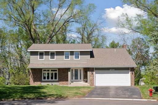 Nestled at the end of a quiet cul-de-sac on a picturesque .42-acre lot backing to serene woods, this stunning two-story home offers the perfect blend of space, functionality,
