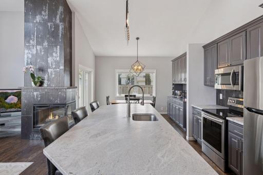 Stunning design elements in the recently updated main living areas of this well-maintained townhome