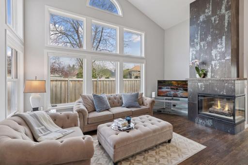 Dramatic fireplace facade adds a sleek design element to this space
