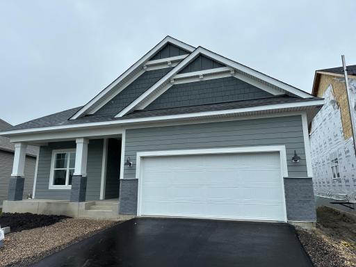 Classic look with a great front porch. This two car garage has a tandem side to it!