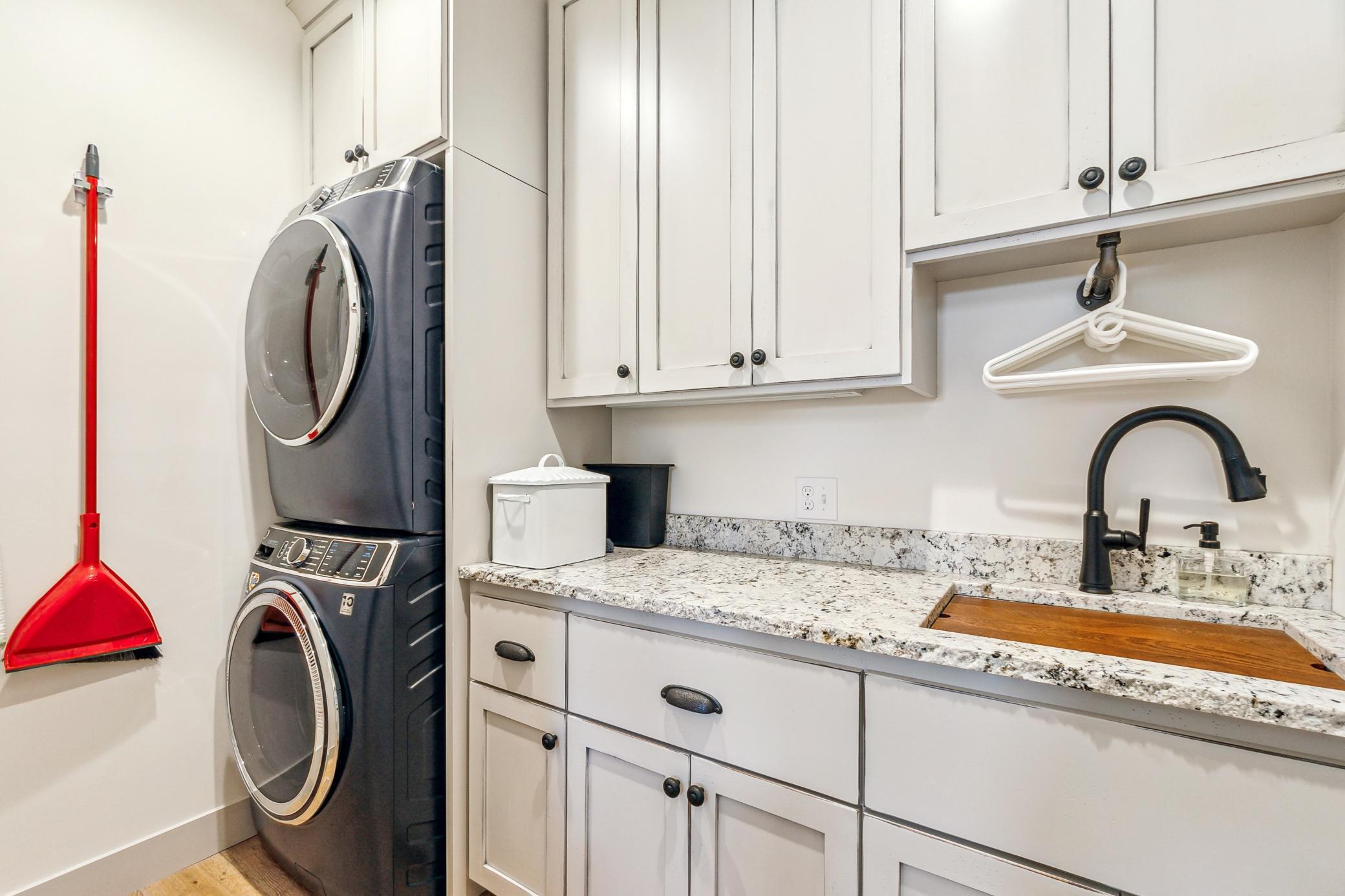 Laundry area within owners suite.