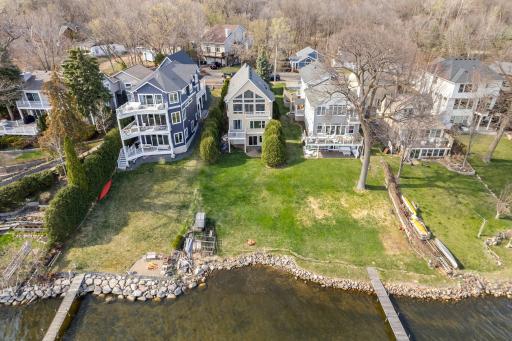 Lots of yard space for outdoor activities and a cozy bonfire on the lake!
