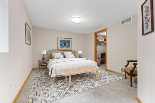 Second bedroom on the lower level (virtually staged)