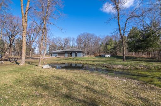 picturesque pond adds to the peaceful story that is this home.