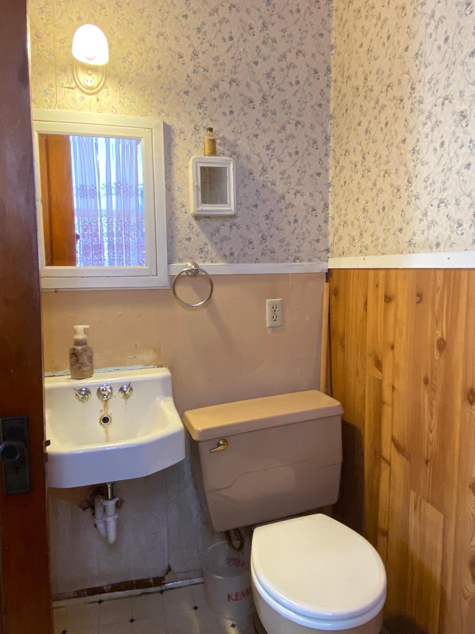 Half bath off of kitchen.
