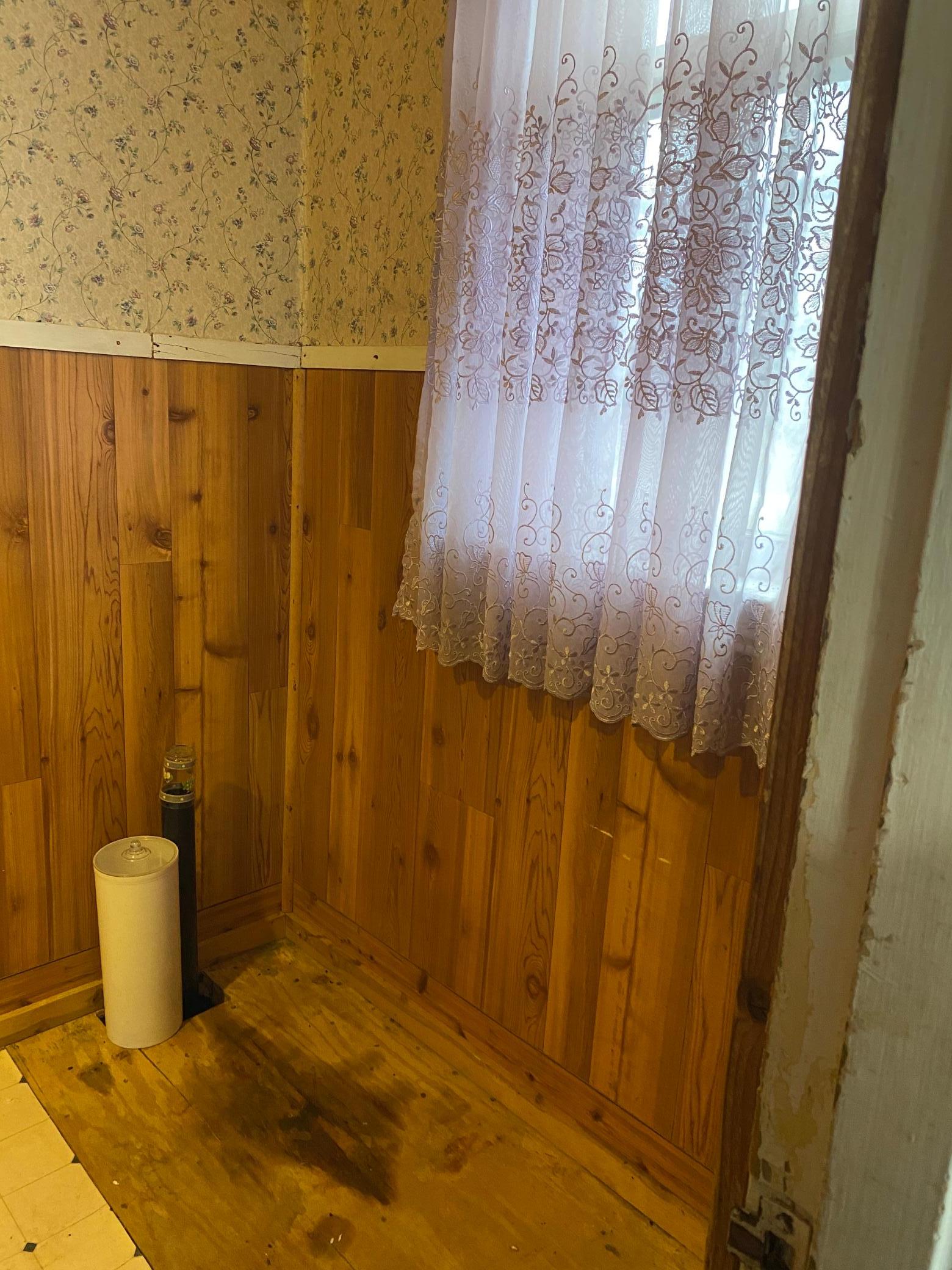Half bath off of kitchen.