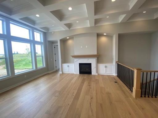 Photo for 7416 Elm Lane, Corcoran, MN 55340 - listing #6706252 Move right into this brand New Home with warranties! Stunning gathering room with 12'H ceiling and coffered ceiling. landscaping, irrigation and sod coming soon! 4 bedrooms! Finished lower level with wet bar! Oversized 2-car garage