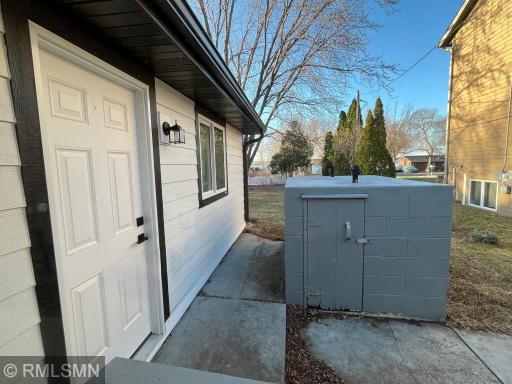 Back door and concrete storm shelter