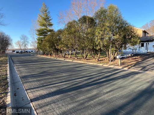 Front of yard with zero lot line and view toward the lake